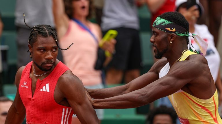 Noah Lyles stares down Olympic teammate after comeback victory, gets shoved afterward