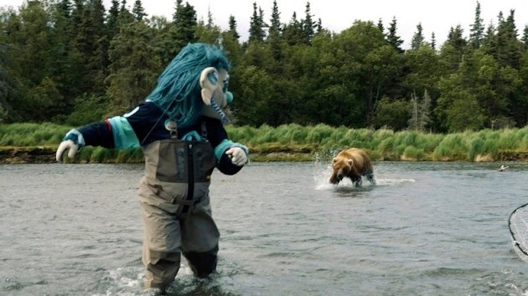 Seattle Kraken mascot charged at by brown bear during video shoot in Alaska