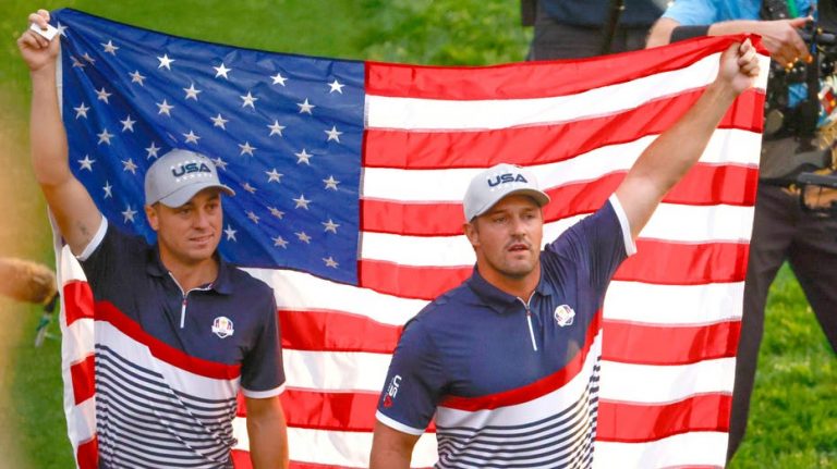 Bryson DeChambeau, Justin Thomas drape USA flag on first tee as fans sing national anthem at Ryder Cup