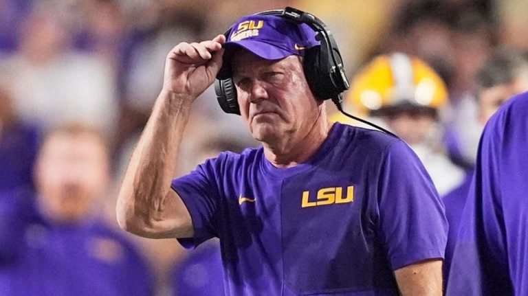 LSU, Florida players steamroll coach Brian Kelly on sidelines