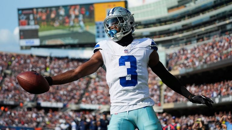 Cowboys' George Pickens slams his helmet in frustration after missed catch leads to interception