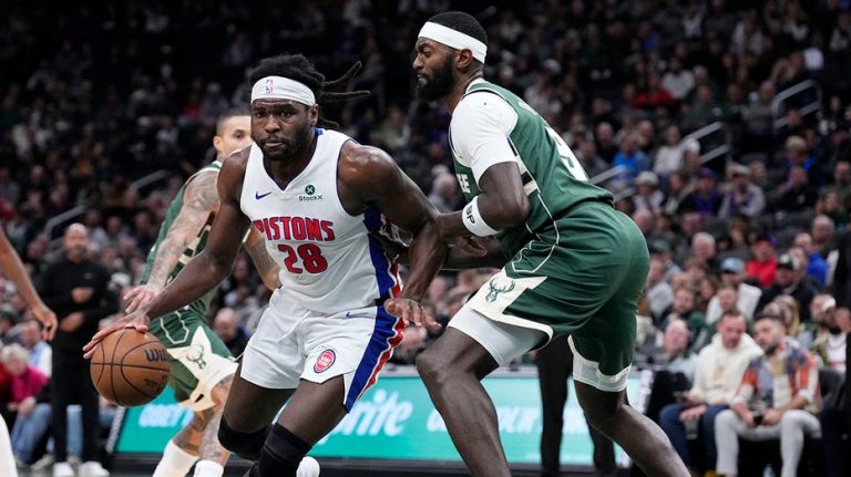 Pistons player holds up fist to opponent during heated skirmish